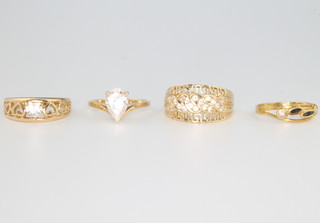 Four 14ct yellow gold gem set rings size Q 