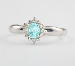 An 18ct white gold gem set ring size N