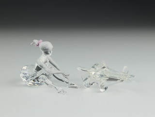 A Swarovski Crystal figure of a seated ballet dancer 3", do. aeroplane 3" 
