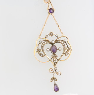 An Edwardian 9ct yellow gold amethyst and seed pearl pendant and chain 