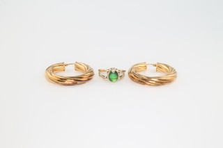 A pair of 9ct yellow gold earrings and a 14ct yellow gold reversible ring size R 