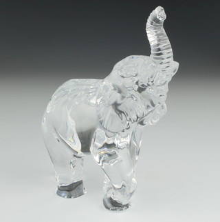 A Waterford Crystal figure of a standing elephant 8" and a do. heart shaped dish 3 1/2", boxed