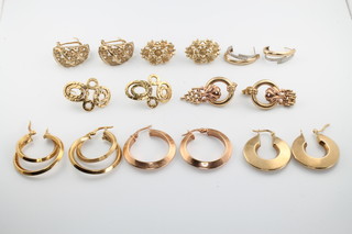 Eight pairs of 9ct yellow gold earrings 25 grams