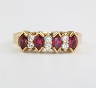 An 18ct yellow gold ruby and diamond half hoop ring size K 