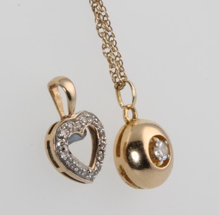 A 9ct diamond set heart pendant and a single stone ditto on a chain 