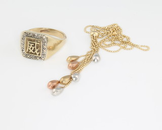 A gentleman's 9ct yellow gold diamond ring with Chinese character size V and a 9ct 3 colour gold necklace 