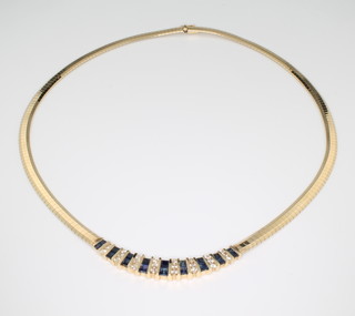 A 14ct yellow gold diamond and sapphire set necklace 