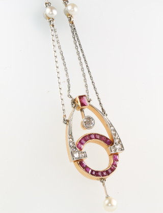 An Art Deco white and yellow gold ruby and diamond drop pendant with baroque pearl 