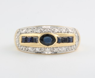 An 18ct yellow gold sapphire and diamond cocktail ring, size M 