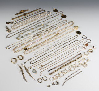 A quantity of silver gilt and other costume jewellery