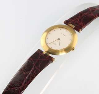 A gilt cased Pierre Cardin quartz gentleman's wristwatch on a leather strap 
