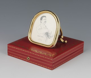 A Cartier gilt photograph frame with easel back set cabochon stones depicting a portrait of Louis Cartier no. 850411475 in a fitted case 