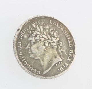A George III sixpence 1825