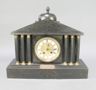A French 8 day striking mantel clock with enamelled dial and Roman numerals contained in a black marble architectural case 