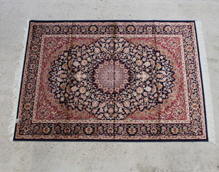 A red and blue ground Belgian cotton "Kashan" style rug with central medallion 75" x 52 1/2" 