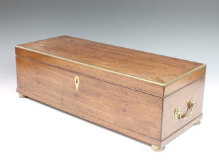 A 19th Century rectangular mahogany box with brass banding, drop handles and bun feet 7"h x 21"w x 8 1/2"d 