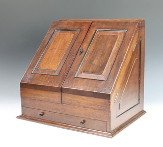 A Victorian mahogany wedge shaped stationery box with stepped fitted interior, the base fitted a drawer 15"h x 16"w x 13"d 