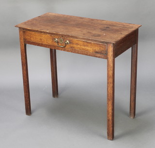 A George III oak side table fitted a drawer on square supports 28"h x 30 1/2"w x 15 1/2"d 