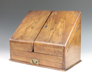 A Victorian walnut wedge shaped stationery box with fitted interior, the base fitted a drawer 12"h x 14"w x 8"d 
