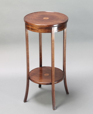 An Edwardian circular inlaid mahogany 2 tier jardiniere stand raised on outswept supports 30 1/2" x 14 1/2" diam. 