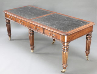 A Victorian style rectangular library table with inset tooled leather writing surface, fitted 8 drawers, raised on 6 turned and reeded supports ending in brass caps and casters  30"h x 79"l x 32"w 