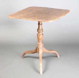 A 19th Century square oak wine table, raised on a turned column and tripod base 29" x 35" x 25" 
