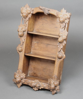 A French 19th Century carved fruitwood hanging range of 3 shelves, carved fruit, 29"h x 17" x 7"d 