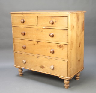 A Victorian polished pine chest of 2 short and 3 long drawers with tore handles on bun feet 40"h x 41"w x 20 1/2"d 