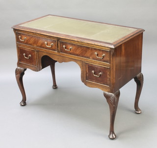 A Queen Anne style mahogany writing table with inset tooled leather writing surface above 2 long and 2 short drawers raised on cabriole supports 29"h x 38 1/2"w x 19"d 