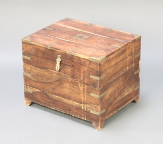 An Eastern hardwood and brass banded trunk with hinged lid 14" x 17" x 14" 
