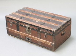 Cumming & Sons, a Victorian wooden and metal bound trunk with hinged lid 13" x 34"w x 18 1/2"d 