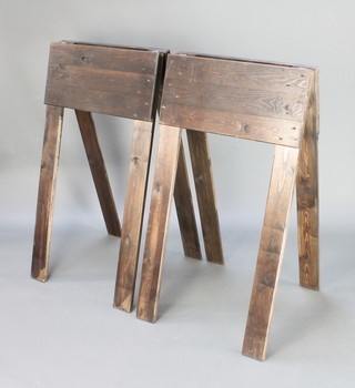 A pair of pine folding saddle stands 41" x 23" x 26" 
