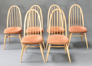 Ercol, a set of 6 light elm stick back dining chairs 