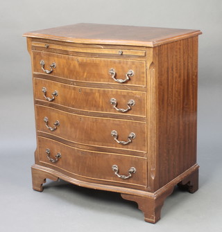 A Georgian style chest of serpentine outline, with crossbanding to the top, fitted a brushing slide above 4 long graduated drawers, raised on bracket feet 30 1/2"h x 27"w x 19"d 