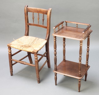 An elm spindle back chair with woven rush seat and a mahogany 2 tier telephone stand 29"h x 14"w x 12"d 