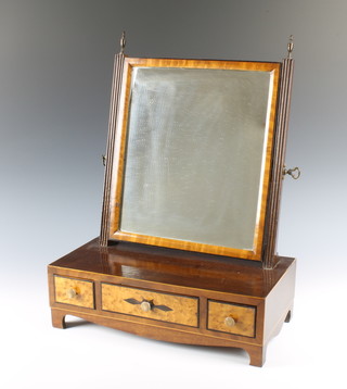 A 19th Century square plate dressing table mirror contained in a mahogany and maple frame, the base fitted 1 long and 2 short drawers with turned ivory handles raised on bracket feet 19"h x 15"w x 8"d