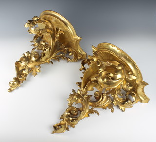 A near pair of 19th Century gilt painted carved wooden and gesso wall brackets 17"h x 15"w x 9"d