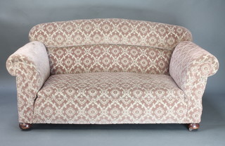 A drop arm Chesterfield upholstered in sculptured dralon, raised on bun feet 31"w x 64"l x 30"d 