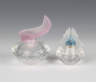Two Swarovski scent bottles, "Flacon Dolphin", No 265896/944800106, 2"h and "Flacon Rose" No 236693/7482000002, designed by Martin Zendron, 2"h, both contained in a fitted box