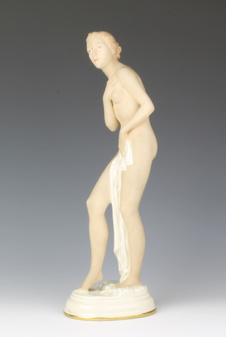 An Art Deco Czechoslovakian figure of a semi clad lady 14 1/2"h