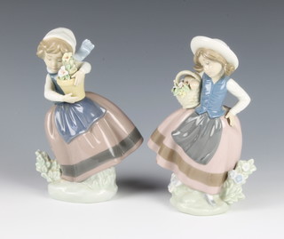 A lladro girl with a basket of flowers 5221 7" one other 7"