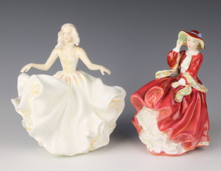 Two Royal Doulton figures "Sweet Seventeen" HN2734 7 1/2"h and "Top O' The Hill" HN1834 7"h