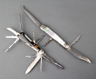 A 19/20th Century multi bladed pocket knife with 4 blades, 8 tools with tortoisehell grip together with one other 2 bladed knife stamped Zulauf Langenthal with saw, corkscrew and mother of pearl grip