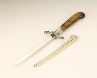 A 19th Century French dagger de vertu dite "Pique Couilles" with 5" polished blade and horn grip