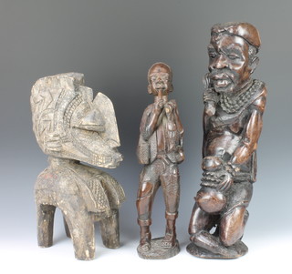 An African carved hardwood figure of a standing gentleman 22" and 1 other fisherman 18", 1 other 18" 