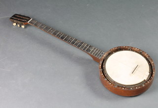 An early 20th Century 5 string zither banjo,  (back panel requiring some attention)