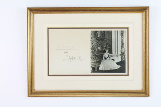 Of Royal Interest, a framed and glazed Christmas card signed from Elizabeth R, with black and white image of seated HM Elizabeth, the Queen Mother 7 1/2"h x 13"w