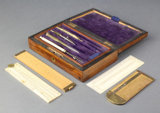 An ivory folding gauge 12", a wooden and brass gauge and a part geometry set contained in a rosewood box
