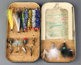 A Hardy Bros vintage fly/cast box 1"h x 6 1/2"w x 3 1/2"d containing various salmon flies and casts