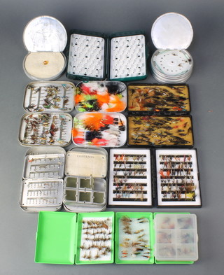 A Wheatley metal fly box and contents, 6 other metal fly boxes and contents, plastic fly boxes etc